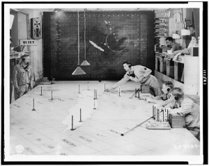 Members of the Signal Corps using radar plotting board as an aircraft warning information center at 1st Island Command Headquarters, Noumea, New Caledonia -- Original Signal Corps Caption