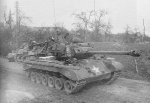 A T26E3 (later M26) Pershing somewherein Europe during WW2. The 90mm gun armed American answer to German "Big Cats - the Panther and Tiger tanks -- was to play a large role in the Invasion of Japan