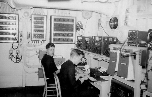 U.S. Navy Shipboard Radio Room showing WWII RAK/RAL & RAO/RBL receivers along with the LM Freq Meter far  upper right and the Scott SLR receiver located just below the order binders.   Source: Radio Boulevard Western Historic Radio Museum online at http://www.radioblvd.com/WWII-PostWar%20Hamgear.htm