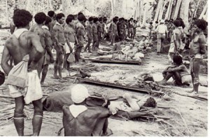 American and Australian casualties, with Papuan Stretcher Bearers.